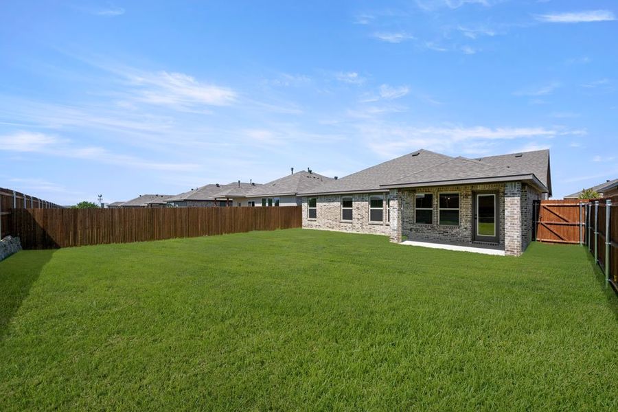 Front exterior of a new home in Baker Farms, Cleburne, TX, highlighting curb appeal (Image 22). Front exterior of a new home in Baker Farms, Cleburne, TX, highlighting curb appeal (Image 22).
