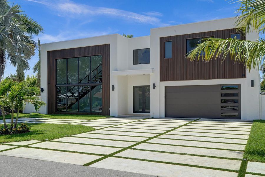 Front exterior of a new home in , Lighthouse Point, FL, highlighting curb appeal (Image 27).