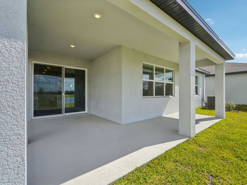 Exterior details and patio area of a home in Coasterra - Reserve Series, Palmetto (Image 3).