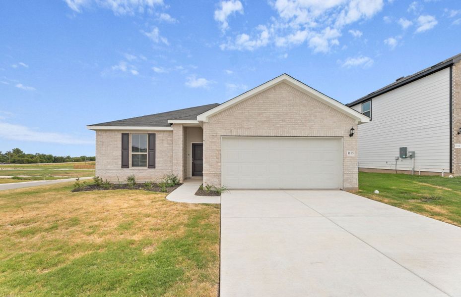 Front exterior of a new home in County View, Temple, TX, highlighting curb appeal (Image 22). Front exterior of a new home in County View, Temple, TX, highlighting curb appeal (Image 22).