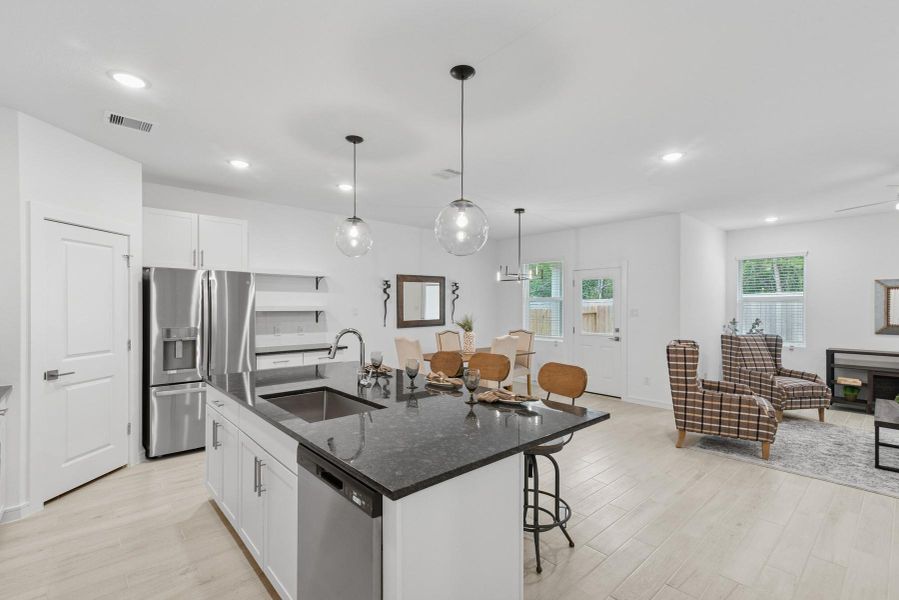 Kitchen open to the great room and dining area Kitchen open to the great room and dining area