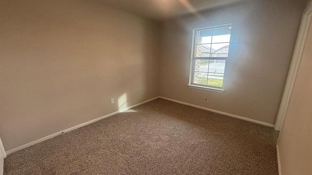 Spacious, unfurnished interior of a new home in Highlands at Chapel Creek, Fort Worth (Image 11).