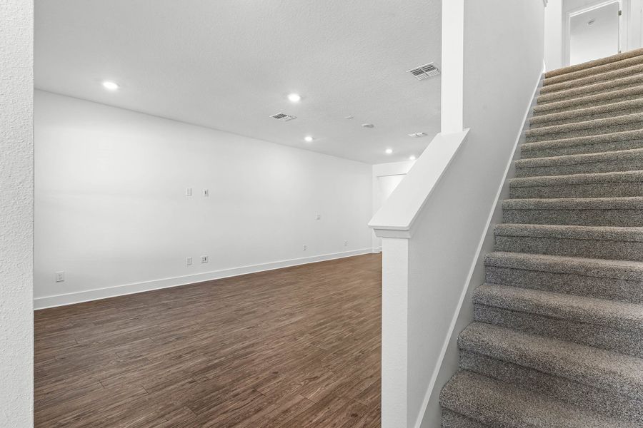 Spacious, unfurnished interior of a new home in Harvest at Ovation - Townhomes, Winter Garden (Image 20).