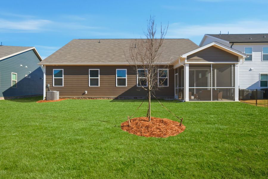 Exterior details and patio area of a home in Waxhaw Landing, Monroe (Image 26).