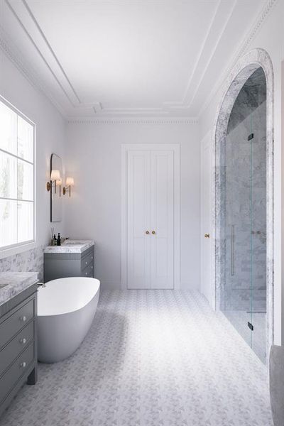 Full bath with a soaking tub, vanity, and a marble finish shower