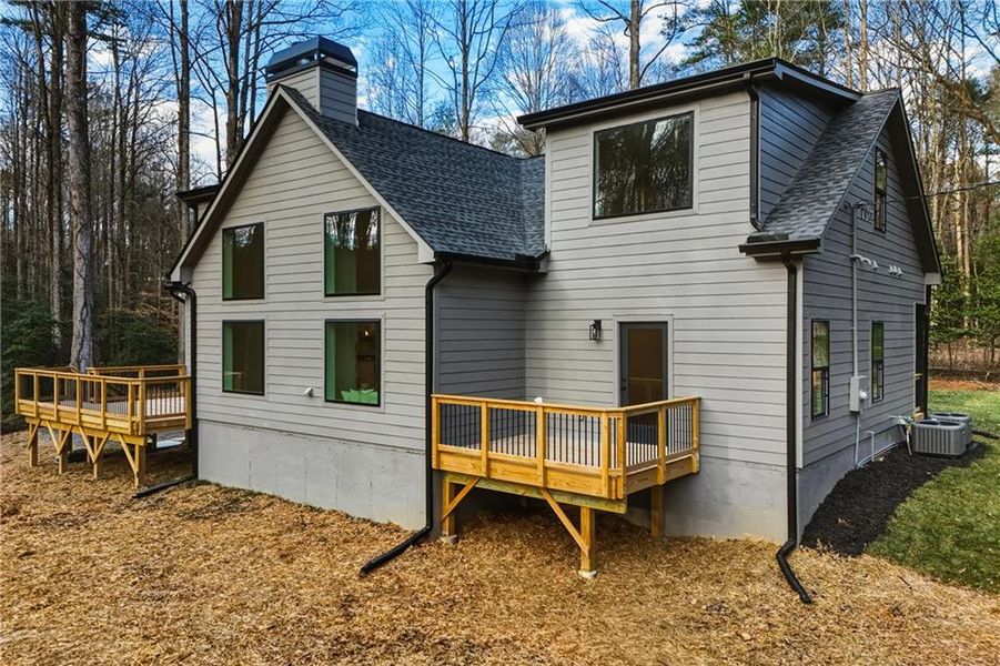 Exterior details and patio area of a home in , Ellijay (Image 24).