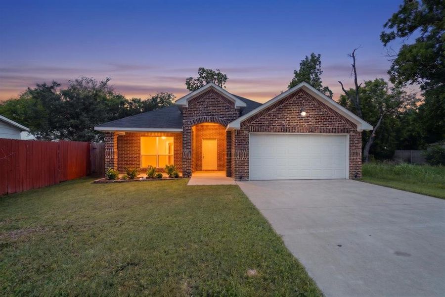 Front exterior of a new home in , Greenville, TX, highlighting curb appeal (Image 2). Front exterior of a new home in , Greenville, TX, highlighting curb appeal (Image 2).