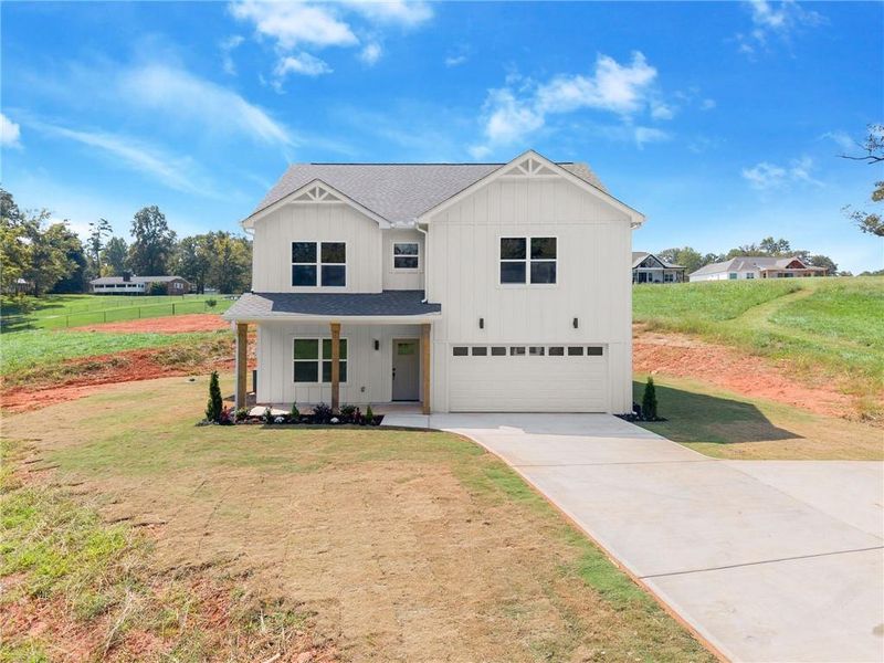 Front exterior of a new home in , Clarkesville, GA, highlighting curb appeal (Image 18).