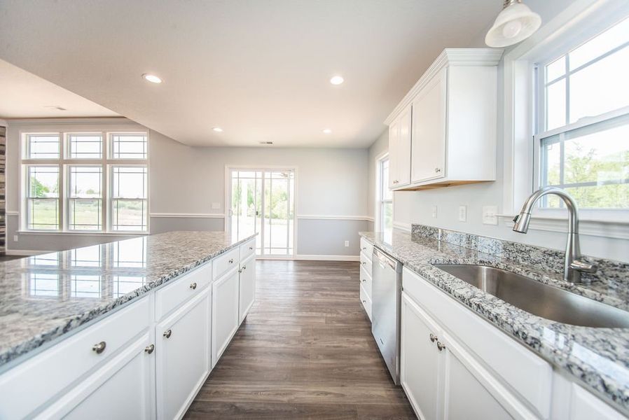 Representative furnished interior of a home built from the Franklin by Enchanted Homes in Guadalupe Heights, Seguin (Image 12).