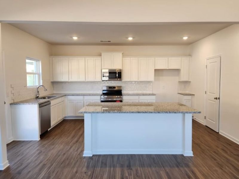 Representative furnished interior of a home built from the Boxwood Townhome by Piedmont Residential in The Retreat at Browns Ridge, Newnan (Image 6).