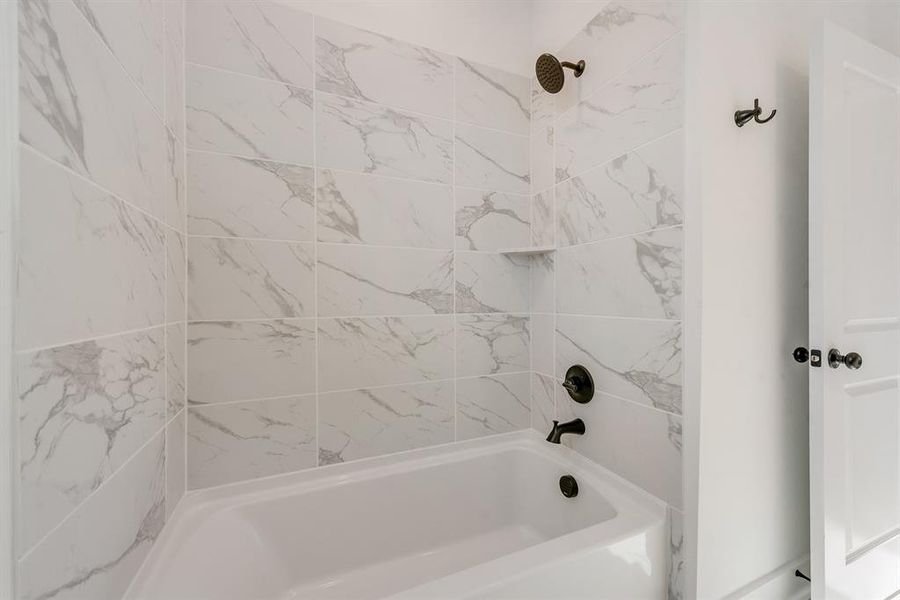 Bathroom with washtub / shower combination Bathroom with washtub / shower combination