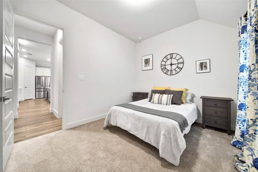 Secondary bedrooms are light and bright with generous closet space.
