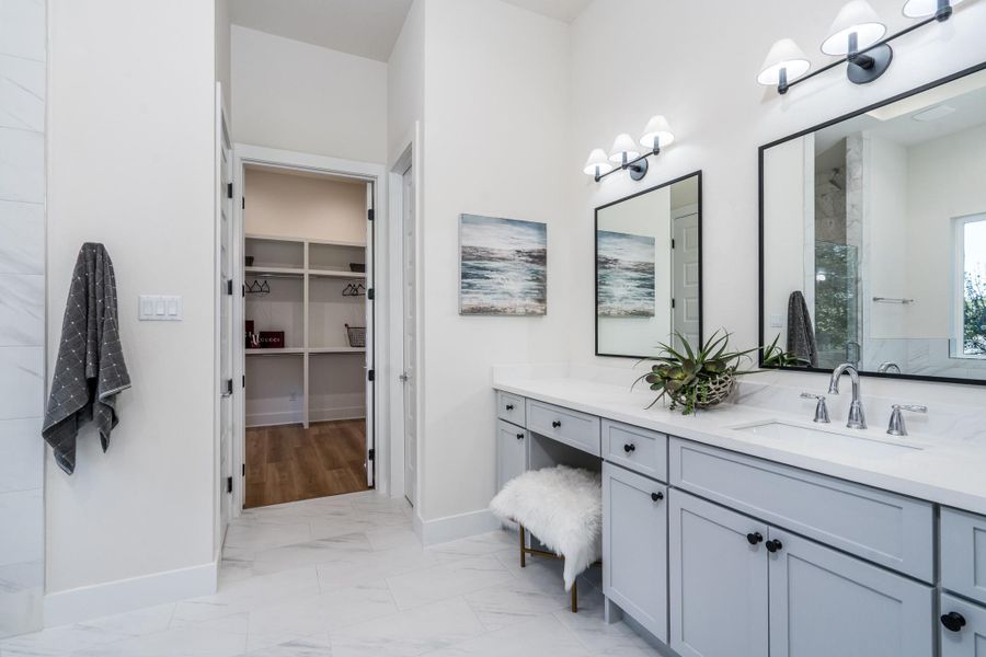 Primary bath opens to the large walk-in closet. Primary bath opens to the large walk-in closet.