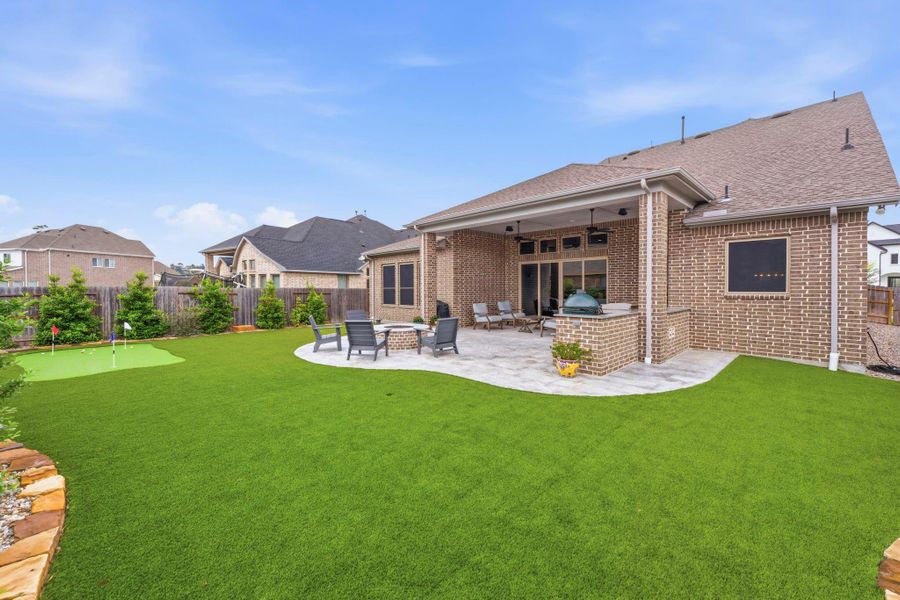 Exterior details and patio area of a home in , Conroe (Image 22).