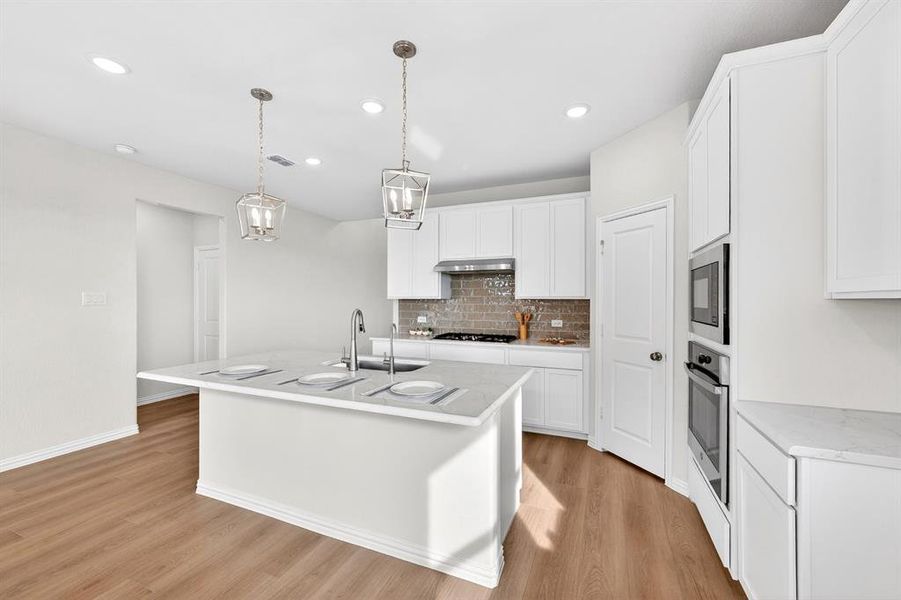 Furnished interior view inside a new home in Lily Creek at Sutton Fields, Aubrey (Image 12). Furnished interior view inside a new home in Lily Creek at Sutton Fields, Aubrey (Image 12).