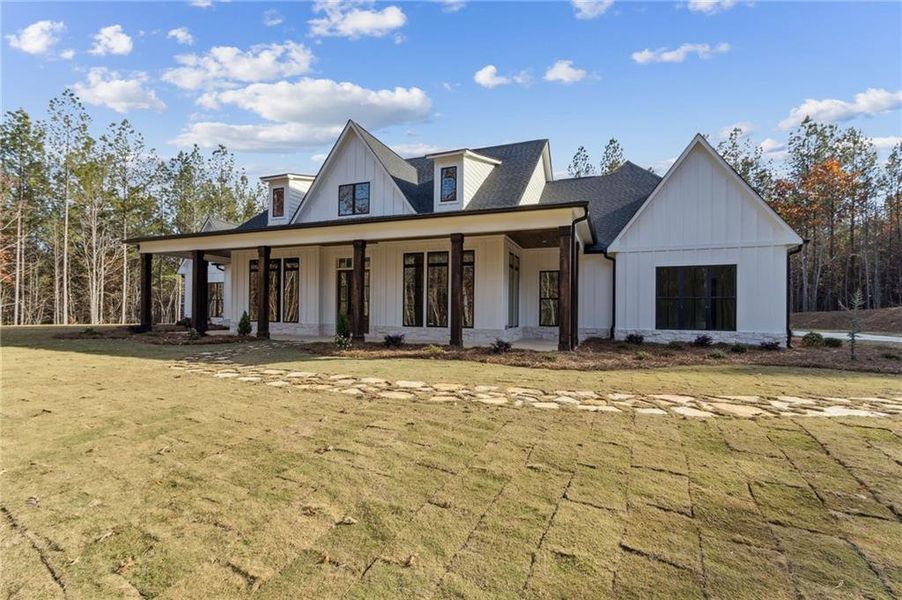Front exterior of a new home in , Dallas, GA, highlighting curb appeal (Image 27). Front exterior of a new home in , Dallas, GA, highlighting curb appeal (Image 27).