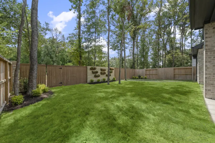 Exterior details and patio area of a home in The Highlands, Porter (Image 4).