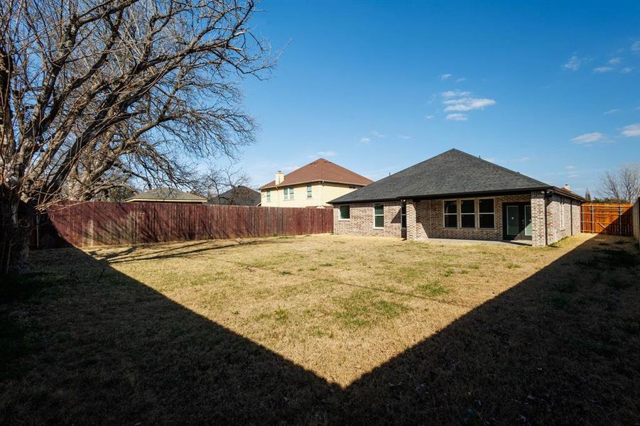 Exterior details and patio area of a home in , Grand Prairie (Image 3). Exterior details and patio area of a home in , Grand Prairie (Image 3).