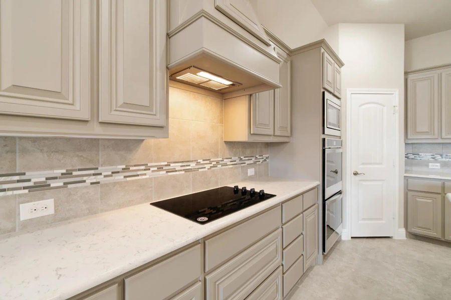 Kitchen | Concept 2129 at Redden Farms - Classic Series in Midlothian, TX by Landsea Homes