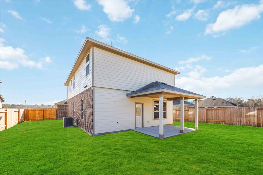 Exterior details and patio area of a home in Splendora Fields, Splendora (Image 23).