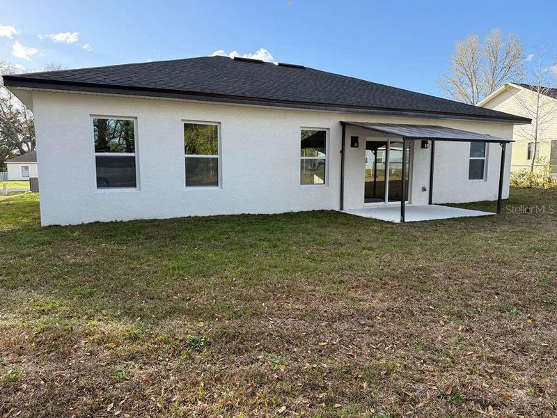 Exterior details and patio area of a home in , Ocala (Image 3).