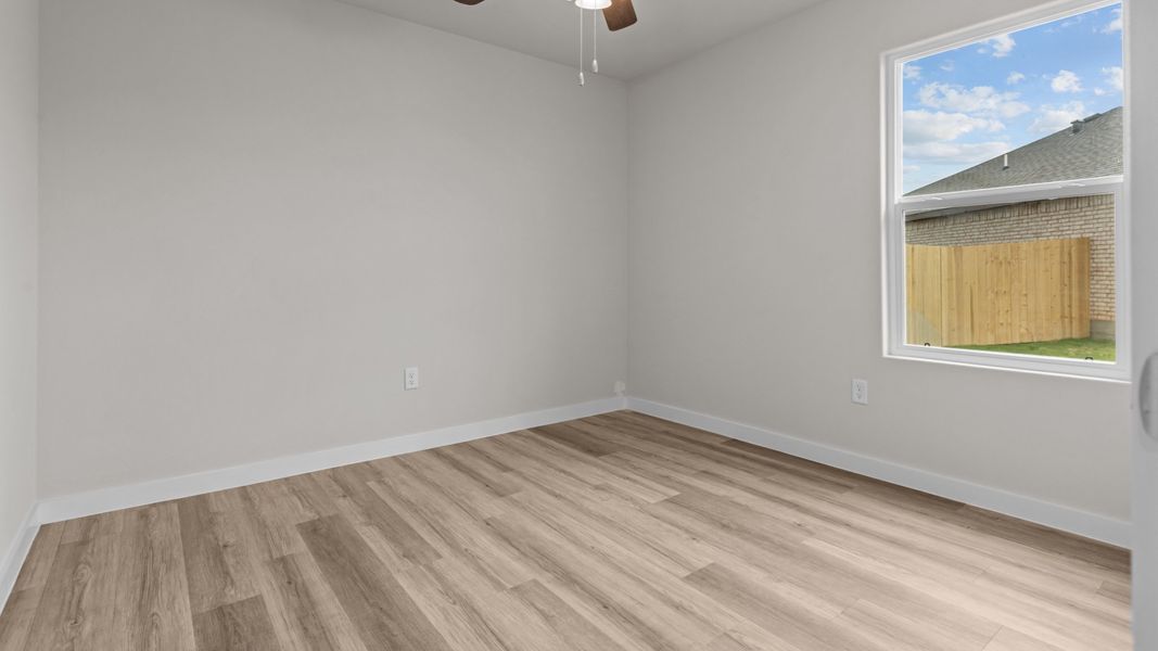 Representative unfurnished interior of a home built from the DEAN by D.R. Horton in Heritage Parks, Abilene (Image 28).