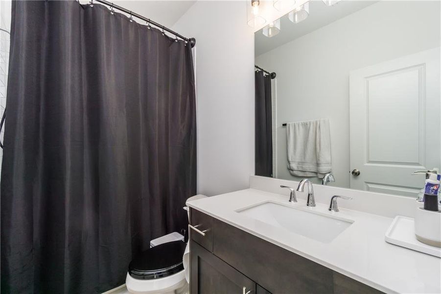 Furnished interior view inside a new home in Evanshire Single Family, Duluth (Image 26).