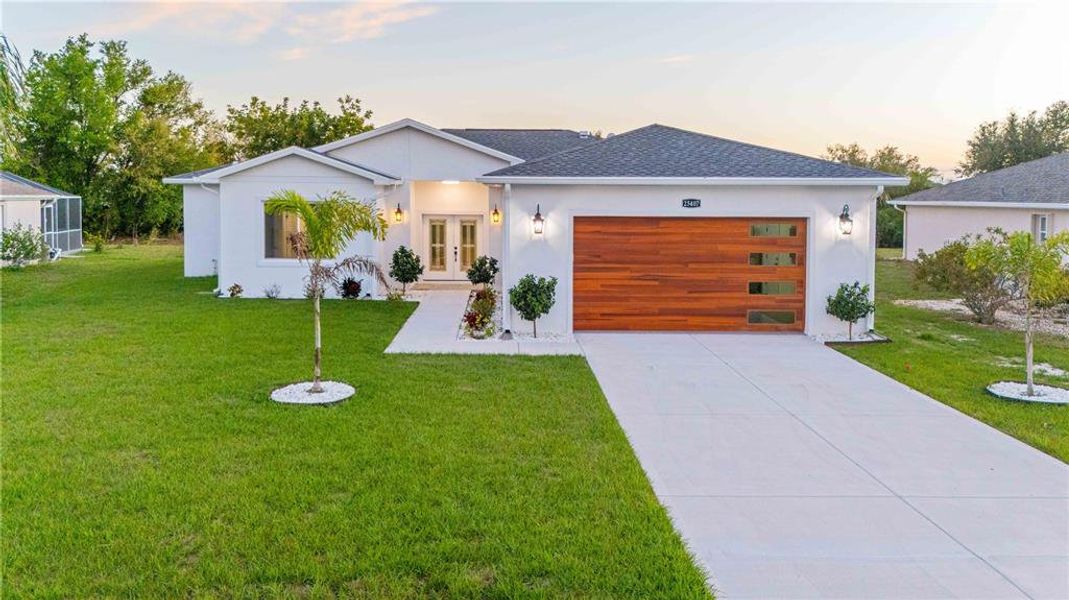 Front exterior of a new home in , Punta Gorda, FL, highlighting curb appeal (Image 31).