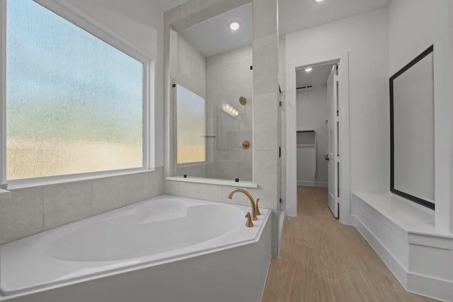 Furnished interior view inside a new home in The Woodlands Hills, Willis (Image 9).