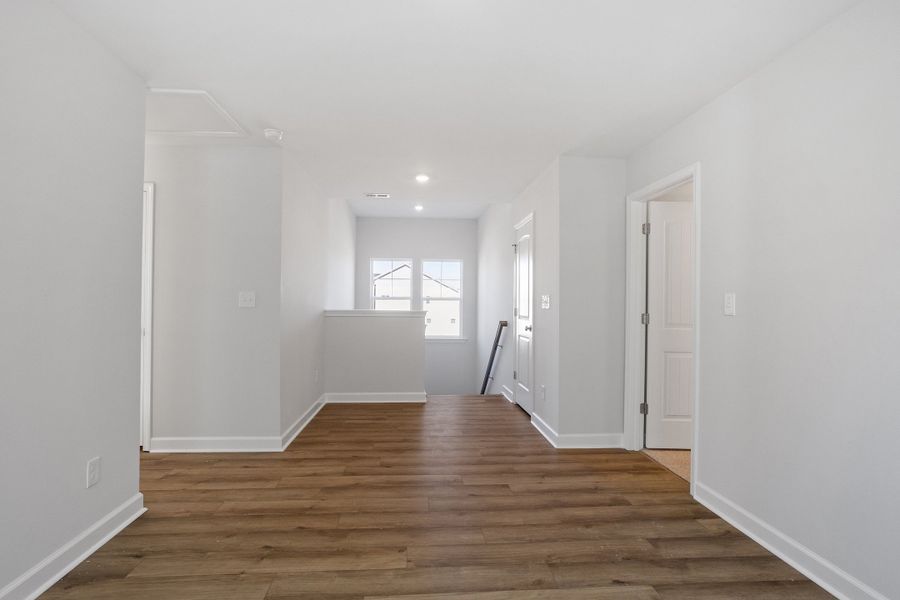 Spacious, unfurnished interior of a new home in Sweetbrier, Durham (Image 23).