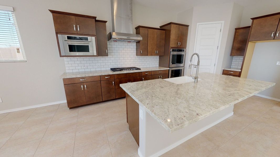 Representative furnished interior of a home built from the Benissa by DRB Homes in Windrose, Waddell (Image 4).
