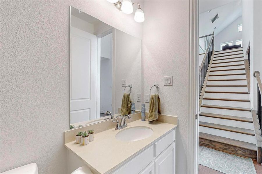 Bathroom with view to better show relation to stairway.