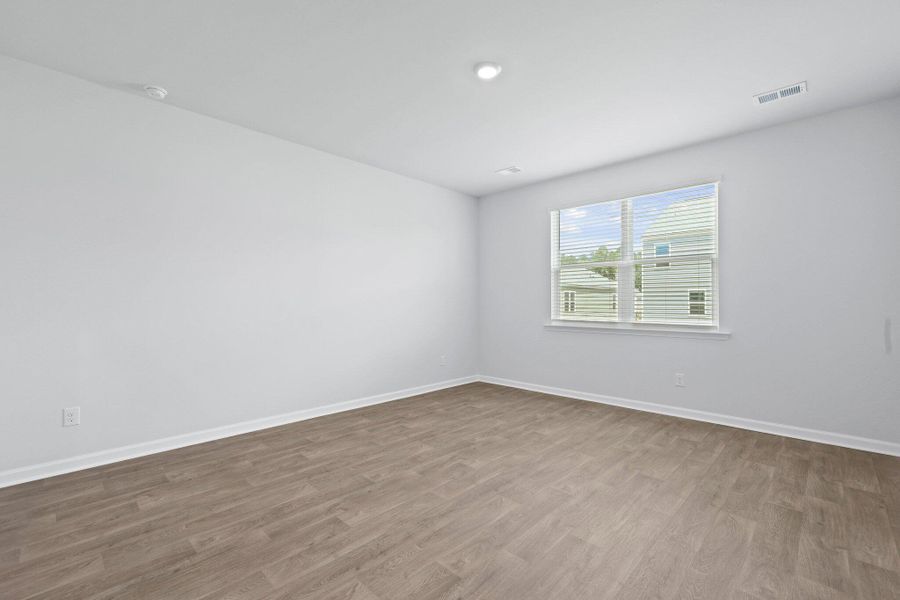 Spacious, unfurnished interior of a new home in Pine Hills at Cane Bay, Summerville (Image 15).