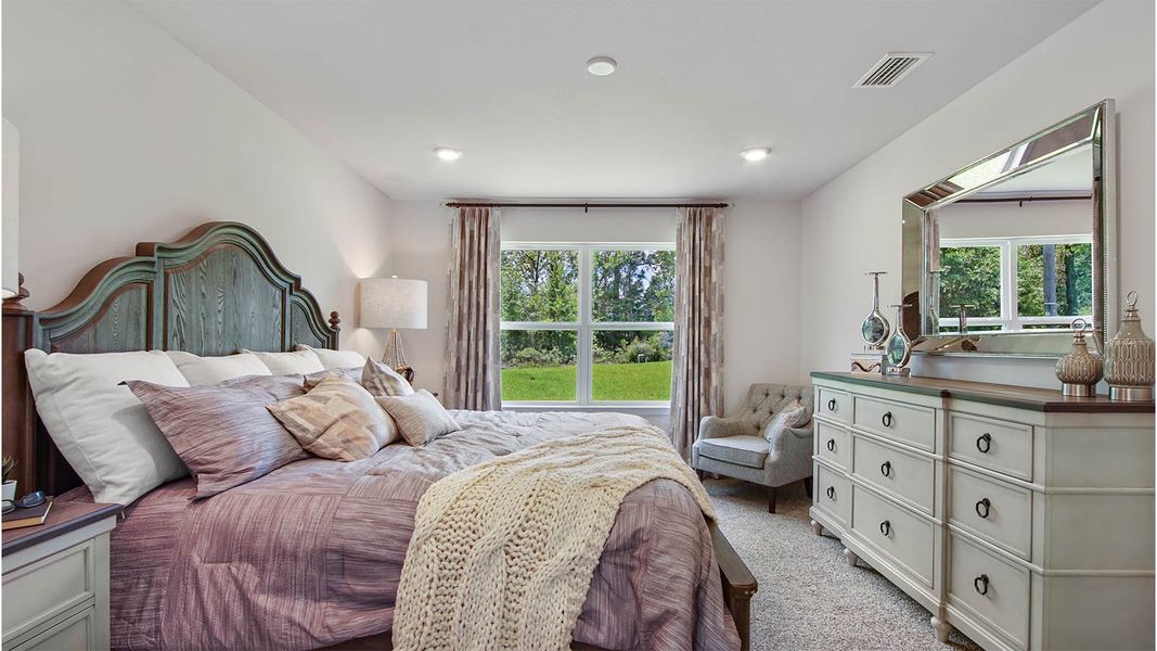 Representative furnished interior of a home built from the Cali by D.R. Horton in Owl's Head East, Freeport (Image 16).