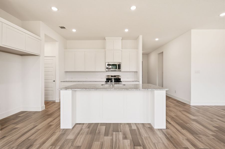 Furnished interior view inside a new home in Saddleback Estates, Boyd (Image 6).