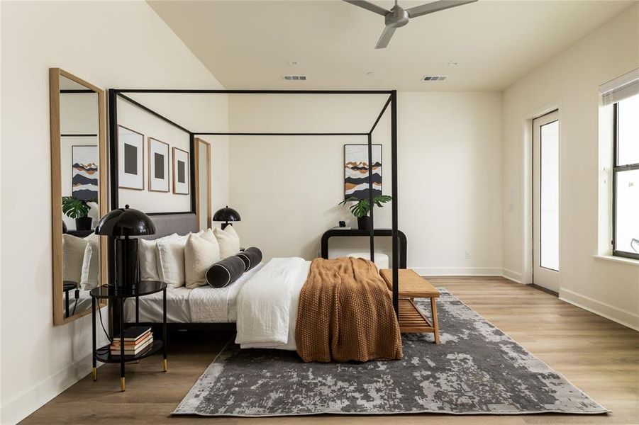 Bedroom featuring hardwood / wood-style flooring and ceiling fan