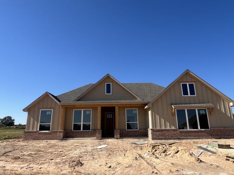 Front exterior of a new home in Zion Valley, Poolville, TX, highlighting curb appeal (Image 2). Front exterior of a new home in Zion Valley, Poolville, TX, highlighting curb appeal (Image 2).