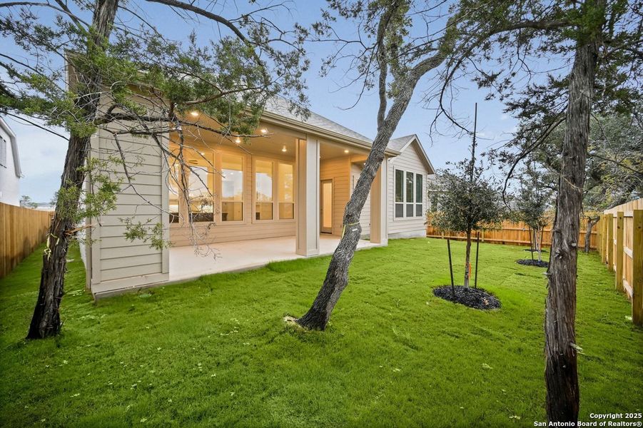 Exterior details and patio area of a home in Davis Ranch: 60ft. lots, San Antonio (Image 18).