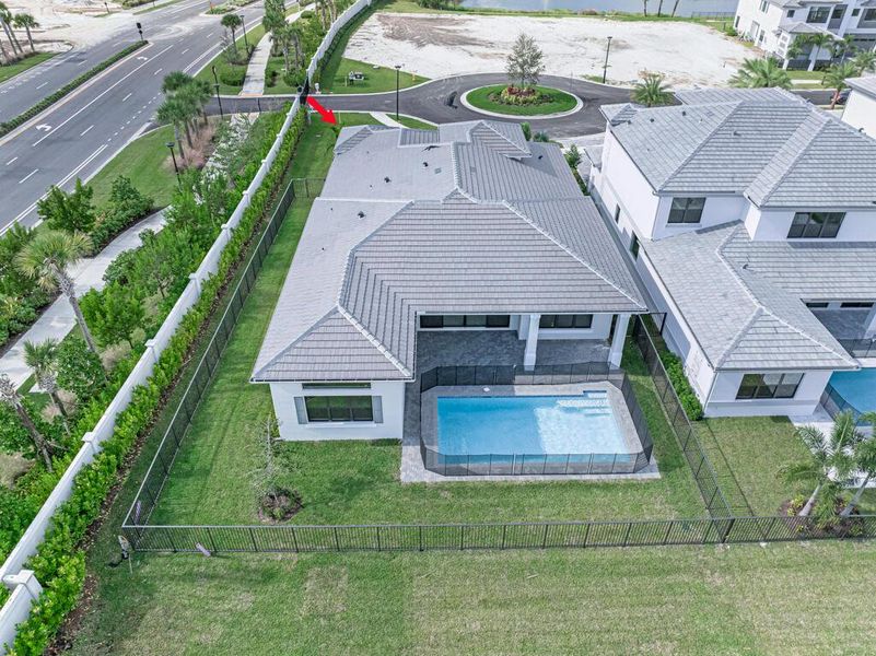 Front exterior of a new home in Apex at Avenir, Palm Beach Gardens, FL, highlighting curb appeal (Image 23). Front exterior of a new home in Apex at Avenir, Palm Beach Gardens, FL, highlighting curb appeal (Image 23).