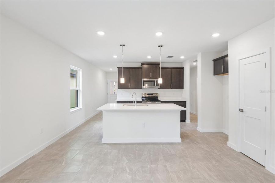 Furnished interior view inside a new home in Grasslands West, Lakeland (Image 8).