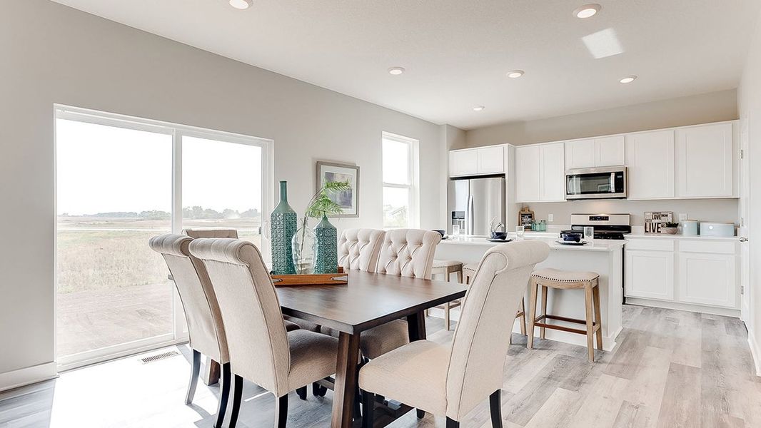Representative furnished interior of a home built from the The Sienna by D.R. Horton in Thornton Townes, Raleigh (Image 6).
