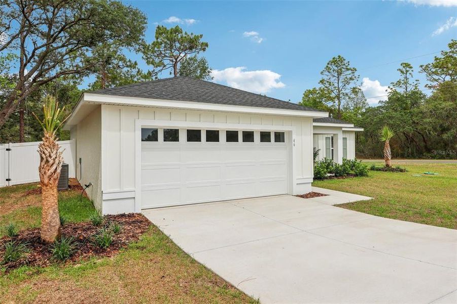 Front exterior of a new home in , Citrus Springs, FL, highlighting curb appeal (Image 19). Front exterior of a new home in , Citrus Springs, FL, highlighting curb appeal (Image 19).