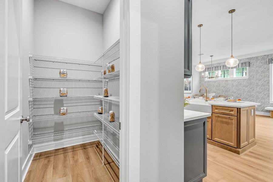 Representative furnished interior of a home built from the Anfield by Fischer Homes in The Villas at Longleaf Park, a Watersound Origins® community, Inlet Beach (Image 13).