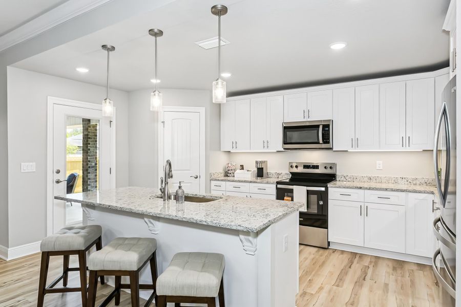 Furnished interior view inside a new home in Buckeyes Landing, Navarre (Image 11).