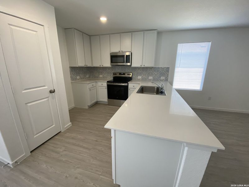 Furnished interior view inside a new home in , Seguin (Image 13).