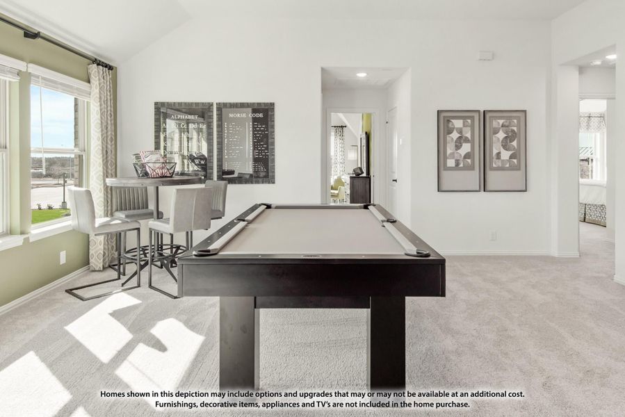 Game room with pool table, carpet flooring, and small dining area near large windows Game room with pool table, carpet flooring, and small dining area near large windows