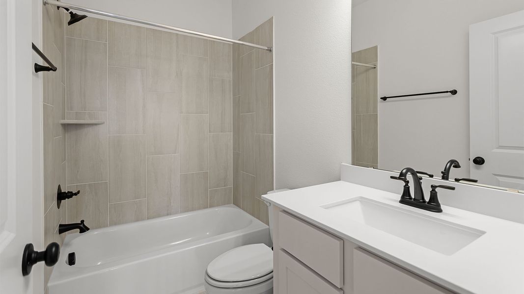 Furnished interior view inside a new home in Legacy, League City (Image 7).