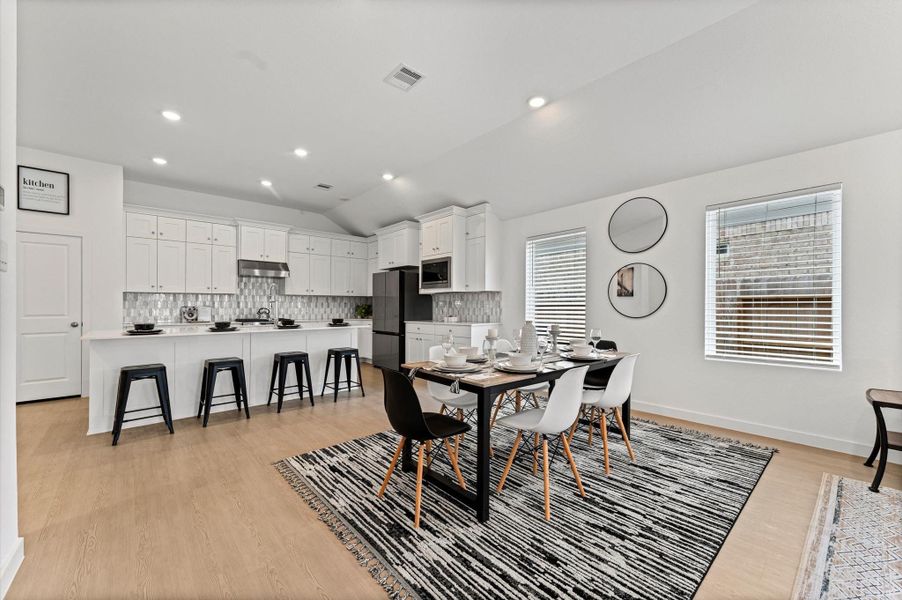 Open concept kitchen with dining area Open concept kitchen with dining area