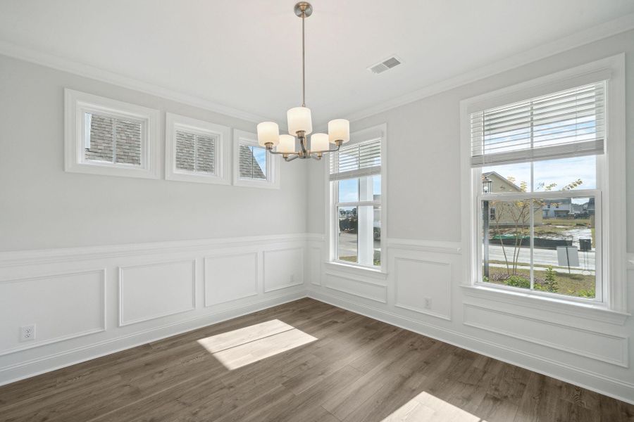 Spacious, unfurnished interior of a new home in Tidewater at Lakes of Cane Bay, Summerville (Image 33).