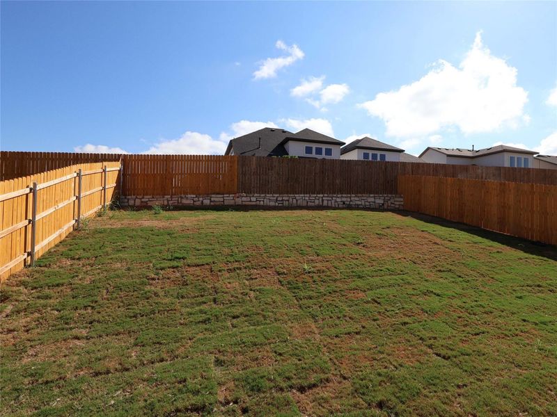 Exterior details and patio area of a home in Cedar Brook, Leander (Image 16). Exterior details and patio area of a home in Cedar Brook, Leander (Image 16).